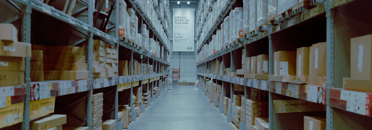 Warehouse aisle with stocked shelving