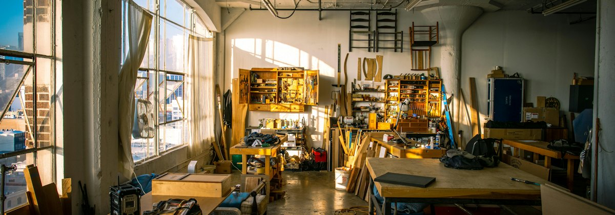 Small business workshop with workbenches and equipment